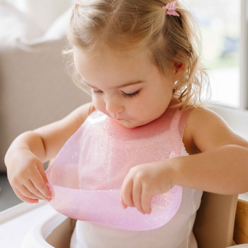 Baby Bib Types Explained: Silicone vs. Cloth vs. Smock