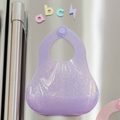 Babynetic Jelly Bib stored on the refrigerator between meals
